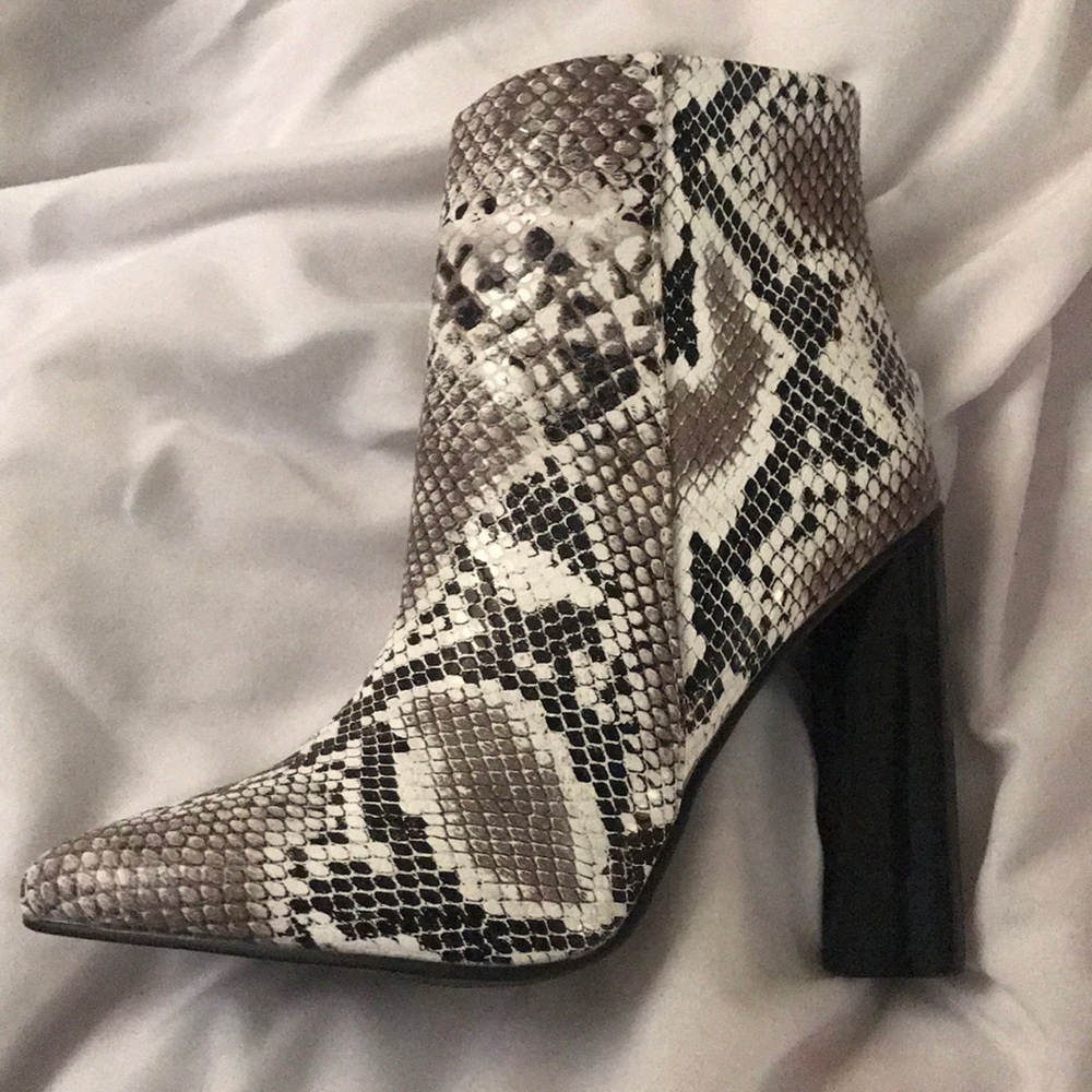 Snakeskin heeled booties 🐉